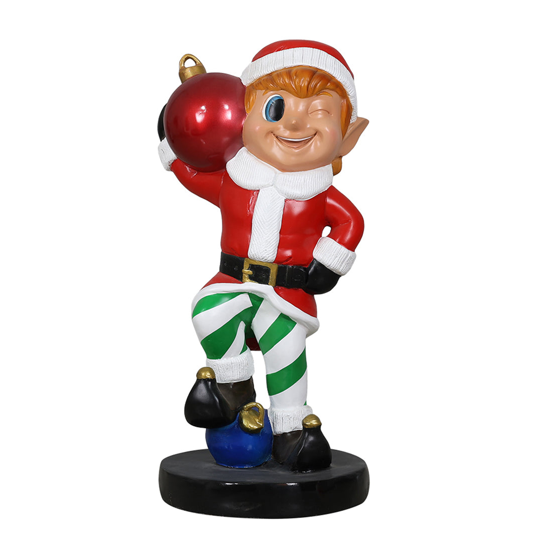 Elf holding ornament ball