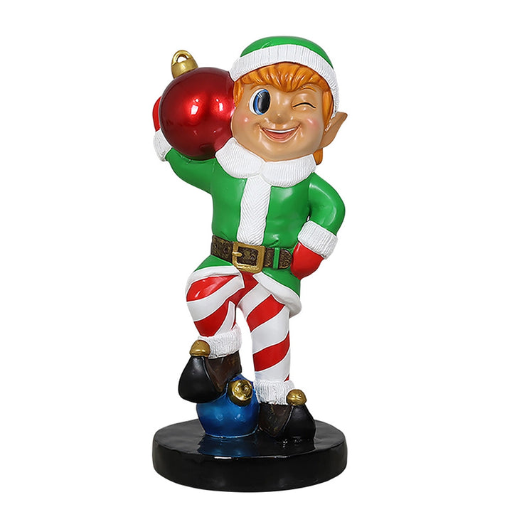 Elf holding ornament ball