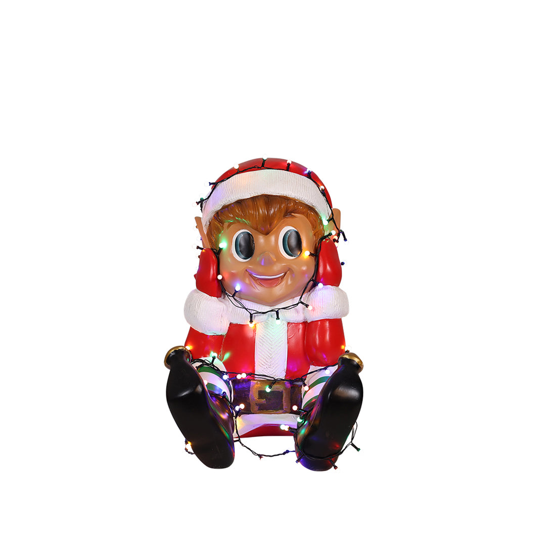 Elf boy playing with lights