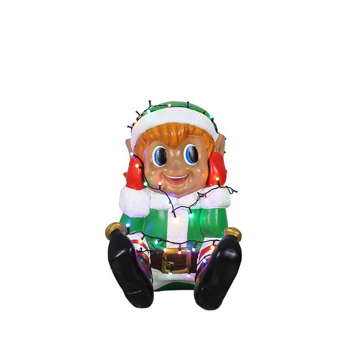 Elf boy playing with lights