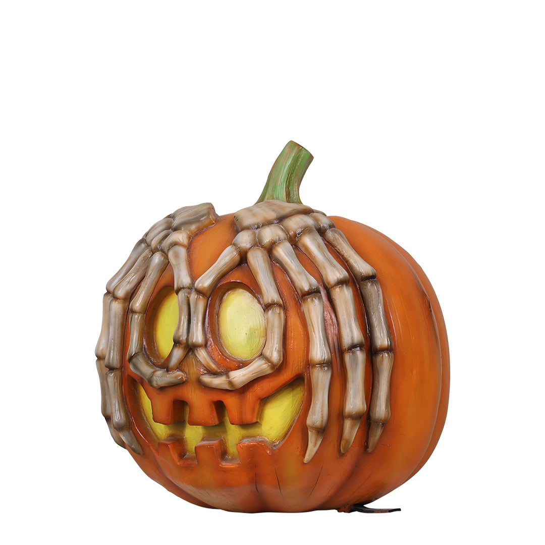 PUMPKIN WITH SKELETON HANDS