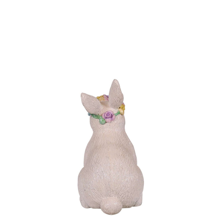 sitting easter bunny statue with flower crown back view