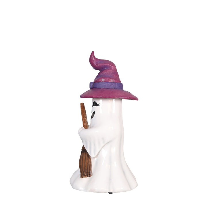a ghost witch girl holding a broom side view