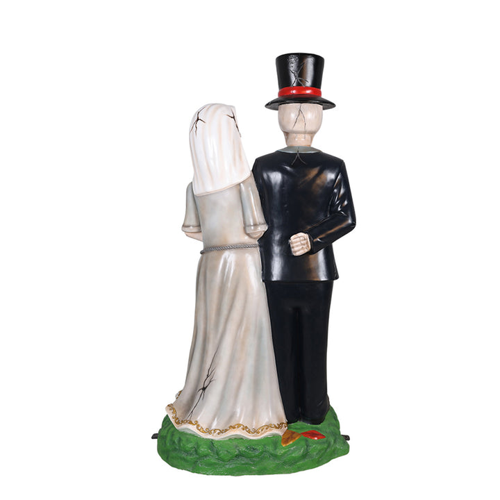 A married couple skeleton statue back view